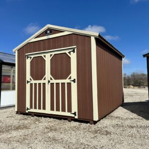 Exterior of small shed with double doors.