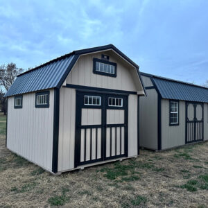Exterior of small barn-styled shed.
