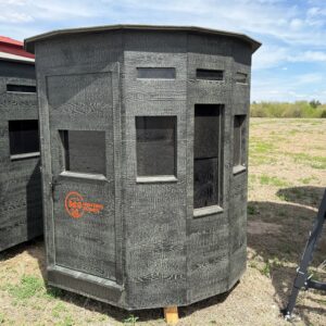 Exterior of hunting blind showing the structure at ground level.
