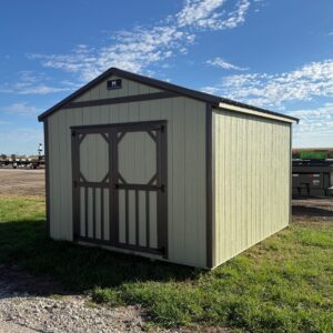 Exterior of shed showcasing large shed doors.